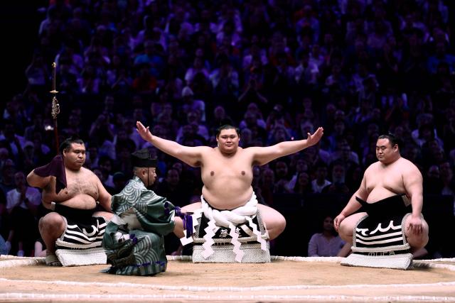 Onosato performs during the Yokozuna rank (grand champion) belt-tying ceremony on day 2 of the 2026 Paris Sumo Tournament, in Paris on June 14, 2026. (Photo by Behrouz MEHRI / AFP)