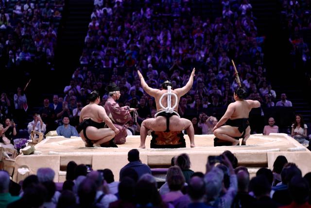 Mongolian Yokozuna (Grand Champion) Hoshoryu performs during the Yokozuna belt-tying ceremony on day 2 of the 2026 Paris Sumo Tournament, in Paris on June 14, 2026. (Photo by Behrouz MEHRI / AFP)