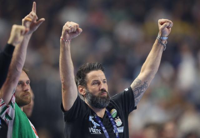 SC Magdeburg's German headcoach Bennet Wiegert gestures during the EHF Men's Handball Champions League Final 4 third place match between Aalborg Handbold and SC Magdeburg in Cologne, western Germany on June 14, 2026. (Photo by Ronny HARTMANN / AFP)