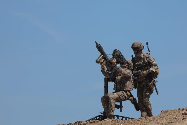 A soldier holds a transportable lightweight anti-air missile Mistral during a dynamic demonstration of military equipment at the Eurosatory defence and security trade show at the Paris Nord Villepinte Exhibition Centre in Villepinte, a northeastern suburb of Paris, on June 14, 2026. The Eurosatory trade show takes place from June 15 to 19, 2026. (Photo by Kenzo TRIBOUILLARD / AFP)