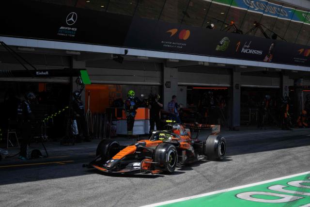 McLaren British driver Lando Norris's car exits the pit stop during the Catalonia Formula One Grand Prix at the Circuit de Catalunya in Montmelo, on the outskirts of Barcelona, on June 14, 2026. (Photo by Manaure QUINTERO / POOL / AFP)