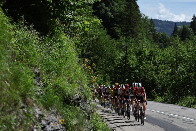 Lidl-Trek's Latvian rider Toms Skujins leads he pack of riders (peloton) during the 8th and final stage of the Tour Auvergne-Rhone-Alpes cycling race (formerly known as the Criterium du Dauphine), 120,1km between Beaufort and Plateau de Solaison, in the French Alps on June 14, 2026. (Photo by Anne-Christine POUJOULAT / AFP)
