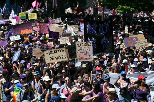 Demonstrators hold placards during a demonstration of a "No-G7" coalition of over 60 associations, unions and left-wing groups "against fascism and imperialism, a day ahead of the summit's start, in Geneva on June 14, 2026. The 2026 edition of the G7 summit is set to take place June 15 to 17 in the French town of Evian-les-Bains near Switzerland, attended by country leaders as well as the EU's foreign policy chief and ministers from Brazil, Canada, the United Arab Emirates and Turkey. (Photo by Fabrice COFFRINI / AFP)