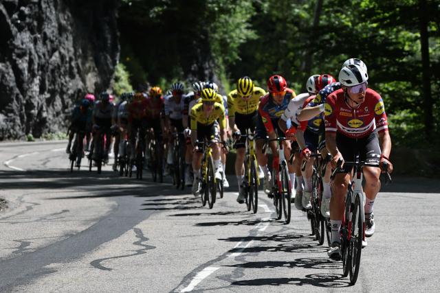 Lidl-Trek's Latvian rider Toms Skujins leads he pack of riders (peloton) during the 8th and final stage of the Tour Auvergne-Rhone-Alpes cycling race (formerly known as the Criterium du Dauphine), 120,1km between Beaufort and Plateau de Solaison, in the French Alps on June 14, 2026. (Photo by Anne-Christine POUJOULAT / AFP)