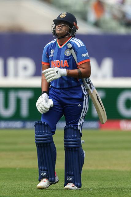 India's Shafali Verma walks off after being dismissed during the ICC Women's T20 cricket World Cup 2026 Group A stage, Match 6 match between the India and Pakistan at Edgbaston cricket ground in Birmingham, central England on June 14, 2026. (Photo by Darren Staples / AFP)