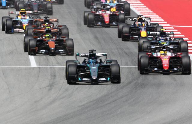 Mercedes' British driver George Russell leads the race during the Catalonia Formula One Grand Prix at the Circuit de Catalunya in Montmelo, on the outskirts of Barcelona, on June 14, 2026. (Photo by Josep LAGO / AFP)