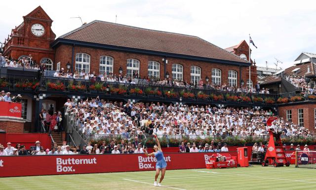 Britain's Emma Raducanu serves against Croatia's Donna Vekic during their women's singles final tennis match at the HSBC WTA Championships at Queen's Club in west London on June 14, 2026. (Photo by Adrian DENNIS / AFP)