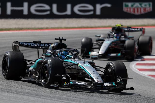 Mercedes' British driver George Russell drives ahead of Mercedes' Italian driver Kimi Antonelli during the Catalonia Formula One Grand Prix at the Circuit de Catalunya in Montmelo, on the outskirts of Barcelona, on June 14, 2026. (Photo by Lluis GENE / AFP)
