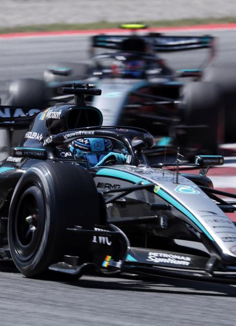 Mercedes' British driver George Russell drives ahead of Mercedes' Italian driver Kimi Antonelli during the Catalonia Formula One Grand Prix at the Circuit de Catalunya in Montmelo, on the outskirts of Barcelona, on June 14, 2026. (Photo by Lluis GENE / AFP)
