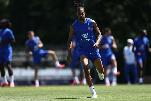 France's forward #11 Michael Olise jogs during a training session at Bentley University, the team's base camp, during the 2026 World Cup football tournament in Waltham, near Boston, on June 14, 2026. (Photo by FRANCK FIFE / AFP)