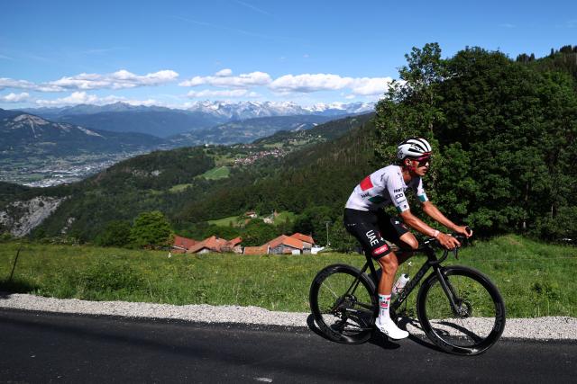 UAE Team Emirates XRG's Mexican rider Isaac Del Toro Romero cycles in a breakaway during the 8th and final stage of the Tour Auvergne-Rhone-Alpes cycling race (formerly known as the Criterium du Dauphine), 120,1km between Beaufort and Plateau de Solaison, in the French Alps on June 14, 2026. (Photo by Anne-Christine POUJOULAT / AFP)