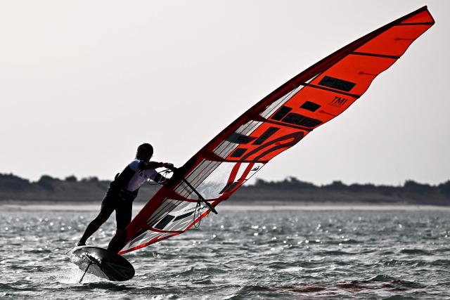 French windsurfer and 27-times world champion Antoine Albeau rides his board during the 4th edition of the Antoine Albeau Series off La Couarde-sur-Mer on the Ré island, southwestern France on June 14, 2026. (Photo by Christophe ARCHAMBAULT / AFP)