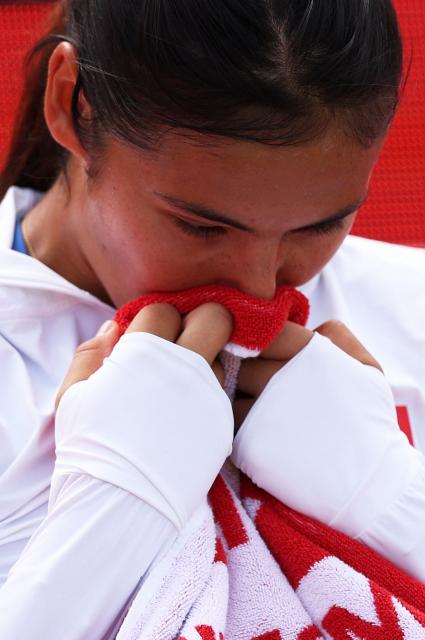 Britain's Emma Raducanu reacts after playing Croatia's Donna Vekic in their women's singles final tennis match at the HSBC WTA Championships at Queen's Club in west London on June 14, 2026. (Photo by Adrian Dennis / AFP)
