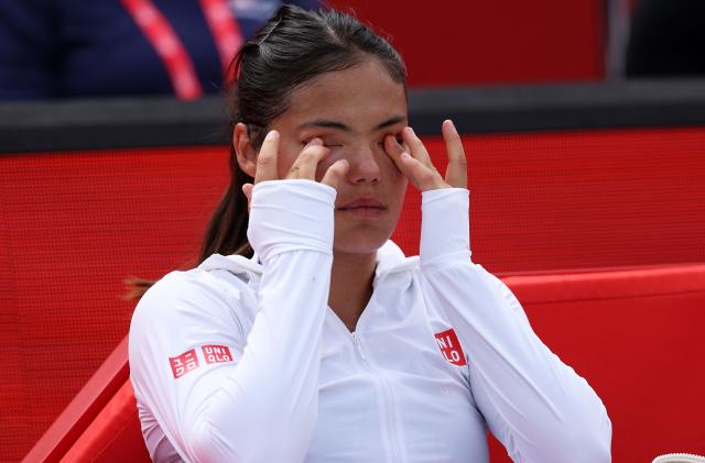 Britain's Emma Raducanu reacts after playing Croatia's Donna Vekic in their women's singles final tennis match at the HSBC WTA Championships at Queen's Club in west London on June 14, 2026. (Photo by Adrian Dennis / AFP)