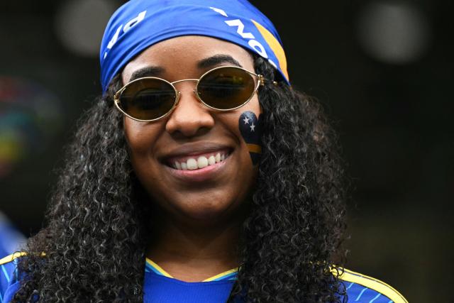 A Curacao supporter poses in the tribunes prior to the 2026 World Cup Group E football match between Germany and Curacao at the Houston Stadium in Houston on June 14, 2026.  (Photo by RONALDO SCHEMIDT / AFP)