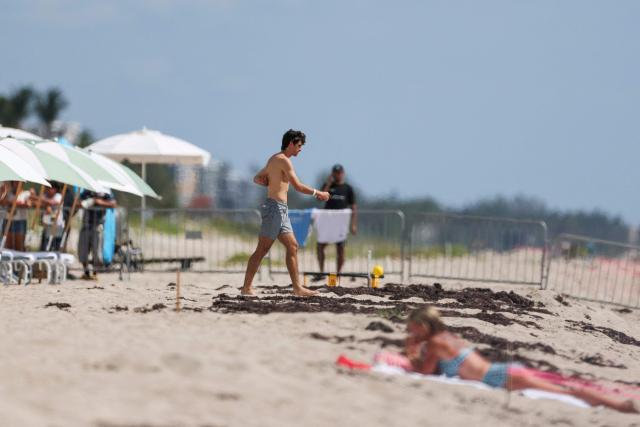 Portugal's forward #16 Francisco Trincao goes for a swim at the beach next to the hotel where the team is staying for the World Cup 2026 in Palm Beach, Florida on June 14, 2026. (Photo by PATRICIA DE MELO MOREIRA / AFP)