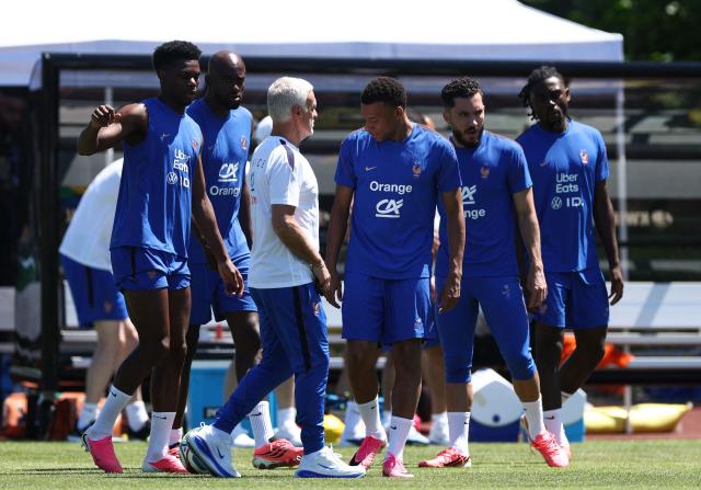 France's midfielder #08 Aurelien Tchouameni, forward #22 Jean-Philippe Mateta, head coach Didier Deschamps, forwards #10 Kylian Mbappe, #24 Rayan Cherki and midfielder #06 Manu Kone attend a training session at Bentley University, the team's base camp, during the 2026 World Cup football tournament in Waltham, near Boston, on June 14, 2026. (Photo by FRANCK FIFE / AFP)