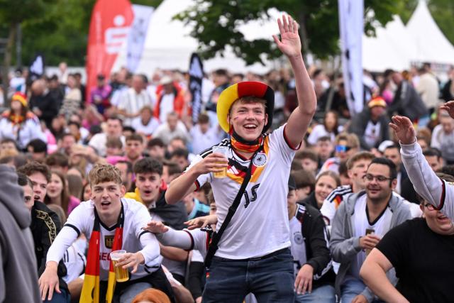 German fans attend the public screening of Germany's opening match at the 2026 World Cup against Curacao at the former coal mine 'Ewald' in Herten, western Germany on June 14, 2026. (Photo by INA FASSBENDER / AFP)