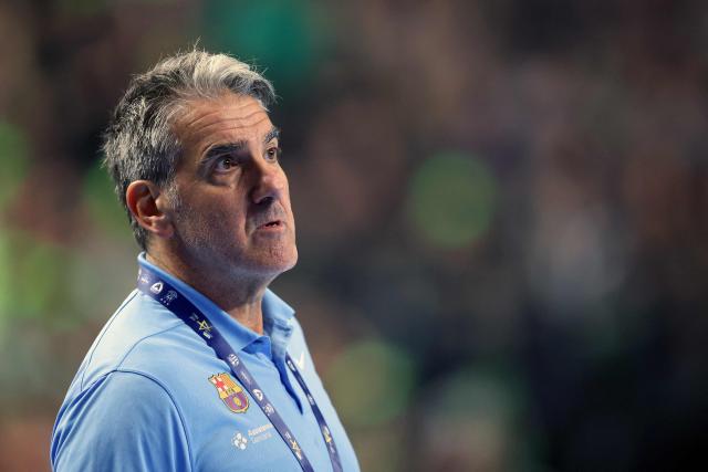 FC Barcelona's Spanish headcoach Antonio Carlos Ortega Perez follows the action from the sidelines during the EHF Men's Handball Champions League Final 4 final between Barca and Fuechse Berlin in Cologne, western Germany on June 14, 2026. (Photo by Ronny HARTMANN / AFP)