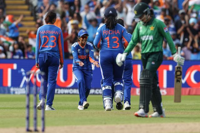 India's Jemimah Rodrigues (2nd L) celebrates after taking the wicket of Pakistan's Tasmia Rubab during the ICC Women's T20 cricket World Cup 2026 Group A stage, Match 6 match between the India and Pakistan at Edgbaston cricket ground in Birmingham, central England on June 14, 2026. (Photo by Darren Staples / AFP)