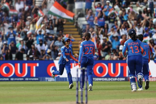 India's Jemimah Rodrigues (L) celebrates after taking the wicket of Pakistan's Tasmia Rubab during the ICC Women's T20 cricket World Cup 2026 Group A stage, Match 6 match between the India and Pakistan at Edgbaston cricket ground in Birmingham, central England on June 14, 2026. (Photo by Darren Staples / AFP)