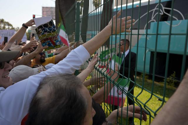 Iran fans wait for the team to leave for US at the Marriott Hotel in Tijuana, Mexico, on June 14, 2026, on the eve of their 2026 World Cup Group G match against New Zealand. (Photo by Guillermo Arias / AFP)