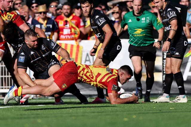 Perpignan's Argentine number eight Joaquin Oviedo scores a try during the French Top14 / ProD2 rugby union access-match for the 2026/27 season between Provence Rugby and Perpignan at the Maurice-David stadium in Aix-en-Provence, near Marseille, on June 14, 2026. (Photo by Thibaud MORITZ / AFP)