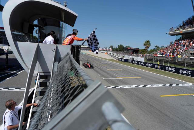 Ferrari's British driver Lewis Hamilton finishes first at the end of the Catalonia Formula One Grand Prix at the Circuit de Catalunya in Montmelo, on the outskirts of Barcelona, on June 14, 2026. (Photo by Manaure QUINTERO / POOL / AFP)