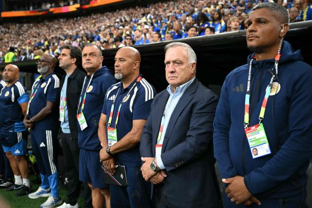 Curacao's Dutch head coach Dick Advocaat (2nd R) stands prior to the 2026 World Cup Group E football match between Germany and Curacao at the Houston Stadium in Houston on June 14, 2026.  (Photo by RONALDO SCHEMIDT / AFP)