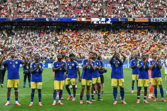 Curacao's players react after losing during the 2026 World Cup Group E football match between Germany and Curacao at the Houston Stadium in Houston on June 14, 2026.  (Photo by RONALDO SCHEMIDT / AFP)