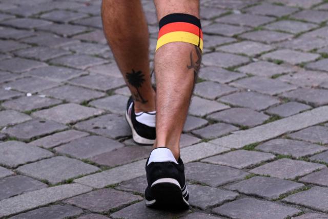 German football fan arrives for the 2026 World Cup Group E football match between Germany and Curacao at a cafe in central Frankfurt am Main, western Germany on June 14, 2026.  (Photo by Kirill KUDRYAVTSEV / AFP)