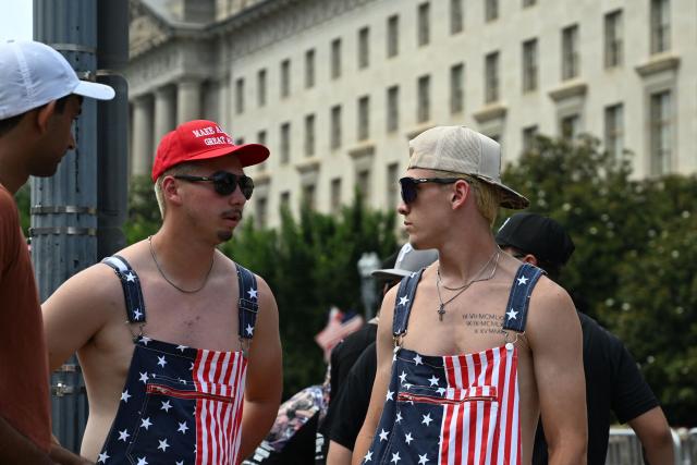 Fans gather in downtown Washington, DC, ahead of the "UFC Freedom 250" mixed martial arts event being held tonight on the South Lawn of the White House in Washington, DC, June 14, 2026. (Photo by Alex WROBLEWSKI / AFP)