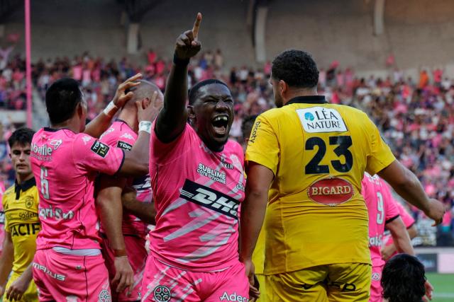Stade Français' French number 8 Yoan Tanga celebrates after his team scores a try during the French Top14 rugby union play-off match between Stade Francais Paris and Stade Rochelais (La Rochelle) at the Jean-Bouin Stadium in Paris on June 14, 2026. (Photo by GEOFFROY VAN DER HASSELT / AFP)