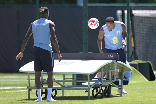 England's defender #02 Ezri Konsa (R) heads the ball before a training session at Swope Soccer Village in Kansas city on June 14, 2026, on the eve of their 2026 World Cup football tournament Group L football match against Croatia. (Photo by Juan MABROMATA / AFP)