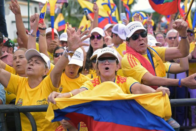 Supporters of Colombia's presidential candidate Abelardo de la Espriella of the Salvadores de la Patria movement attend his closing campaign rally in Buga, Valle del Cauca department, Colombia on June 14, 2026. Colombia will hold the runoff presidential election on June 21. (Photo by JOAQUIN SARMIENTO / AFP)