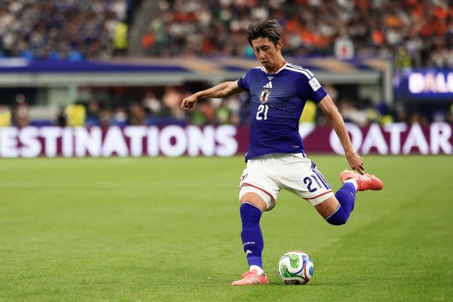 Japan's defender #21 Hiroki Ito kicks the ball  during the 2026 World Cup Group F football match between the Netherlands and Japan at the Dallas Stadium in Arlington on June 14, 2026.  (Photo by Aric Becker / AFP)