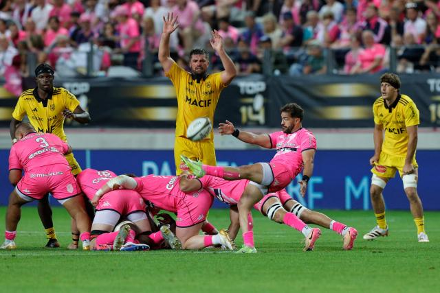 Stade Français' French scrum-half Paul Abadie kicks the ball during the French Top14 rugby union play-off match between Stade Francais Paris and Stade Rochelais (La Rochelle) at the Jean-Bouin Stadium in Paris on June 14, 2026. (Photo by GEOFFROY VAN DER HASSELT / AFP)