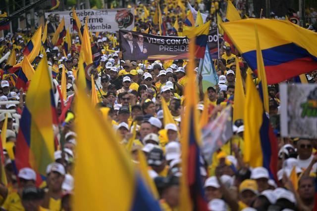 Supporters of Colombia's presidential candidate Abelardo de la Espriella of the Salvadores de la Patria movement attend his closing campaign rally in Buga, Valle del Cauca department, Colombia on June 14, 2026. Colombia will hold the runoff presidential election on June 21. (Photo by JOAQUIN SARMIENTO / AFP)
