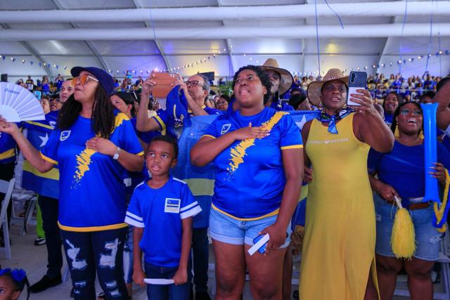 Supporters of Curacao cheer for their team as they watch the transmission of the FIFA World Cup match Germany vs Curacao in Willemstad, Curacao, on June 14, 2026. (Photo by Pong Pong / AFP)