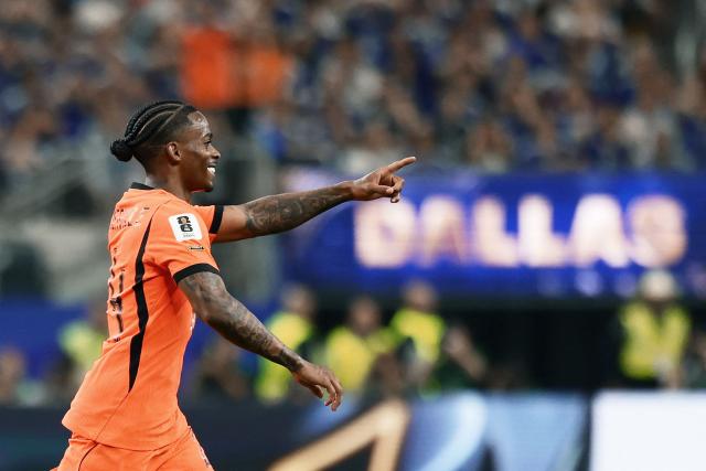 Netherlands' forward #24 Crysencio Summerville celebrates after scoring his team's second goal during the 2026 World Cup Group F football match between the Netherlands and Japan at the Dallas Stadium in Arlington on June 14, 2026.  (Photo by Aric Becker / AFP)