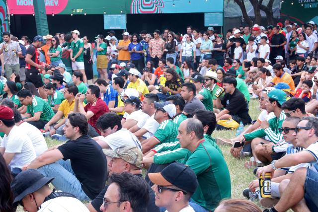 Fans watch the FIFA World Cup match between the Netherlands and Japan on a screen at the fan fest in Monterrey, Nuevo Leon state, Mexico, on June 14, 2026. (Photo by Julio Cesar SALAZAR / AFP)