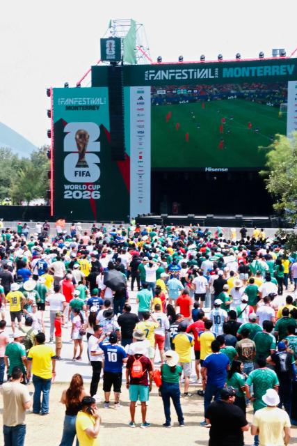 Fans watch the FIFA World Cup match between the Netherlands and Japan on a screen at the fan fest in Monterrey, Nuevo Leon state, Mexico, on June 14, 2026. (Photo by Julio Cesar SALAZAR / AFP)