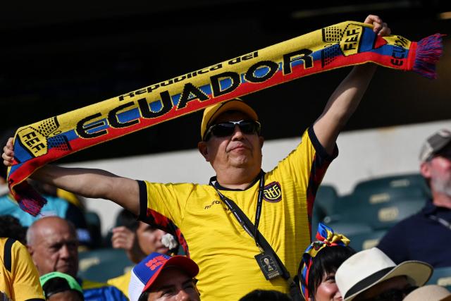 An Ecuadorian fan shows a scarf ahead of the 2026 World Cup Group E football match between Ivory Coast and Ecuador at the Philadelphia Stadium in Philadelphia on June 14, 2026.  (Photo by MAURO PIMENTEL / AFP)