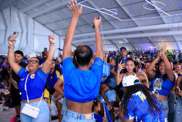 Supporters of Curacao cheer for their team as they watch the transmission of the FIFA World Cup match Germany vs Curacao in Willemstad, Curacao, on June 14, 2026. (Photo by Pong Pong / AFP)