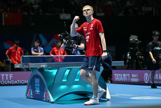 (FILES) France's Felix Lebrun celebrates beating China's Lin Shidong in their Men's Teams semi-final match at the ITTF World Table Tennis Championships in Wembley Arena, west London on May 9, 2026. Fйlix Lebrun was crowned French table tennis champion for the second year in a row on June 14, 2026 in Laval, western France defeating his older brother Alexis in six games (4–2). (Photo by Glyn KIRK / AFP)