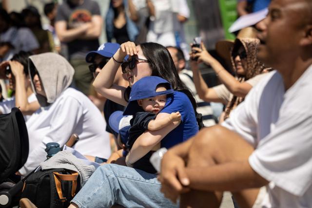 A family of Japan supporters react during the second half of the match of the 2026 World Cup football tournament between Japan and the Netherlands, at a watch party in the Little Tokyo neighborhood of Los Angeles, California, on June 14, 2026. (Photo by ETIENNE LAURENT / AFP)