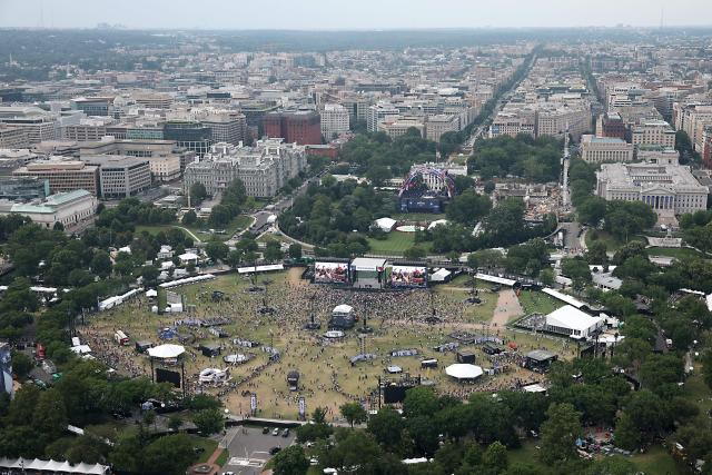The UFC Freedom 250 Fan Fest on The Ellipse and the UFC Freedom 250 fight on the South Lawn of the White House are seen from the top of the Washington Monument on June 14, 2026 in Washington, DC. (Photo by Win McNamee / POOL / AFP)