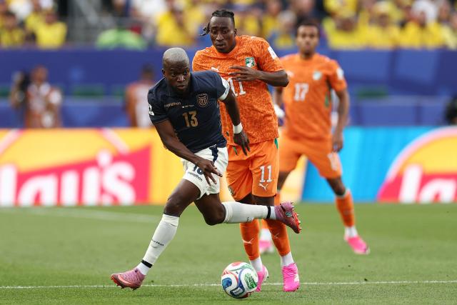 Ecuador's forward #13 Enner Valencia and Ivory Coast's forward #11 Yan Diomande fight for the ball during the 2026 World Cup Group E football match between Ivory Coast and Ecuador at the Philadelphia Stadium in Philadelphia on June 14, 2026.  (Photo by CHARLY TRIBALLEAU / AFP)
