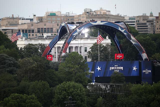 "The Claw" and stadium seating risers for the UFC Freedom 250 fight are seen on the South Lawn of the White House on June 14, 2026 in Washington, DC (Photo by Kevin Dietsch / POOL / AFP)