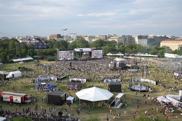Fans attend the UFC Freedom 250 Fan Fest on The Ellipse ahead of the UFC Freedom 250 fight on the South Lawn of the White House on June 14, 2026 in Washington, DC. (Photo by Kevin Dietsch / POOL / AFP)